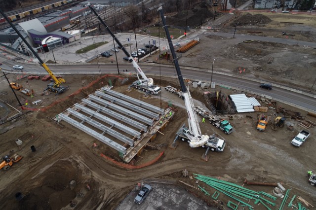 E.55th and Opportunity Corridor Blvd. - beam erection - looking east - RTA rapid station in background. Taken March 2020.
