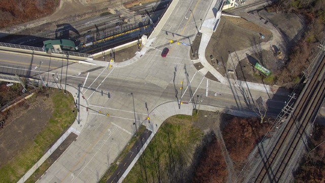 E.105 St. and Quincy Ave. - new alignment intersection and first new alignment road to south. Taken November 2018.
