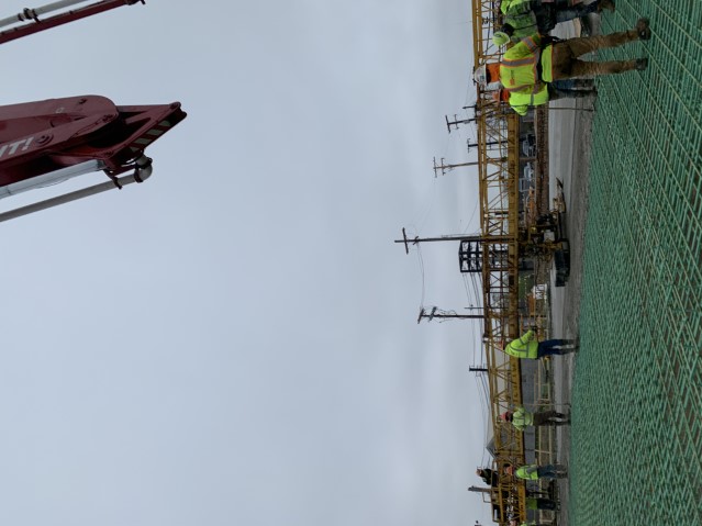 Crews place the deck of the East 55th Street bridge in early-May 2020.